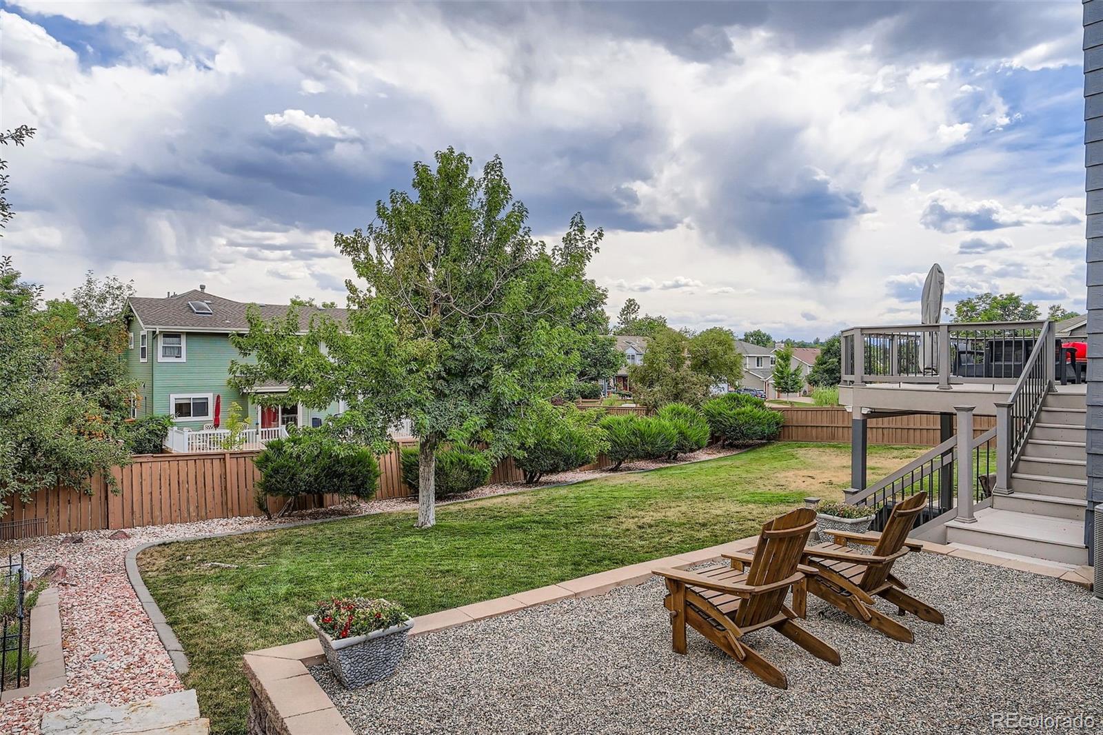 202 Northridge Road Highlands Ranch, CO 80126 - Photo 33 of 37 a view of a backyard with sitting area