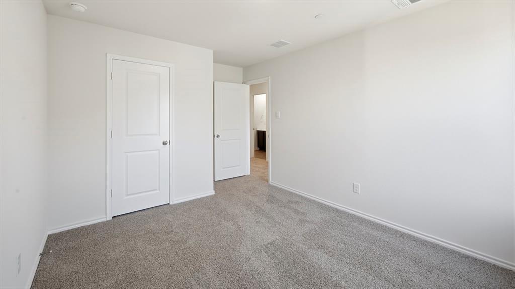 206 Redwood Road Princeton, TX 75407 - Photo 17 of 40 a view of an empty room