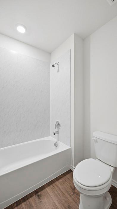 206 Redwood Road Princeton, TX 75407 - Photo 6 of 40 a bathroom with a toilet and a bathtub