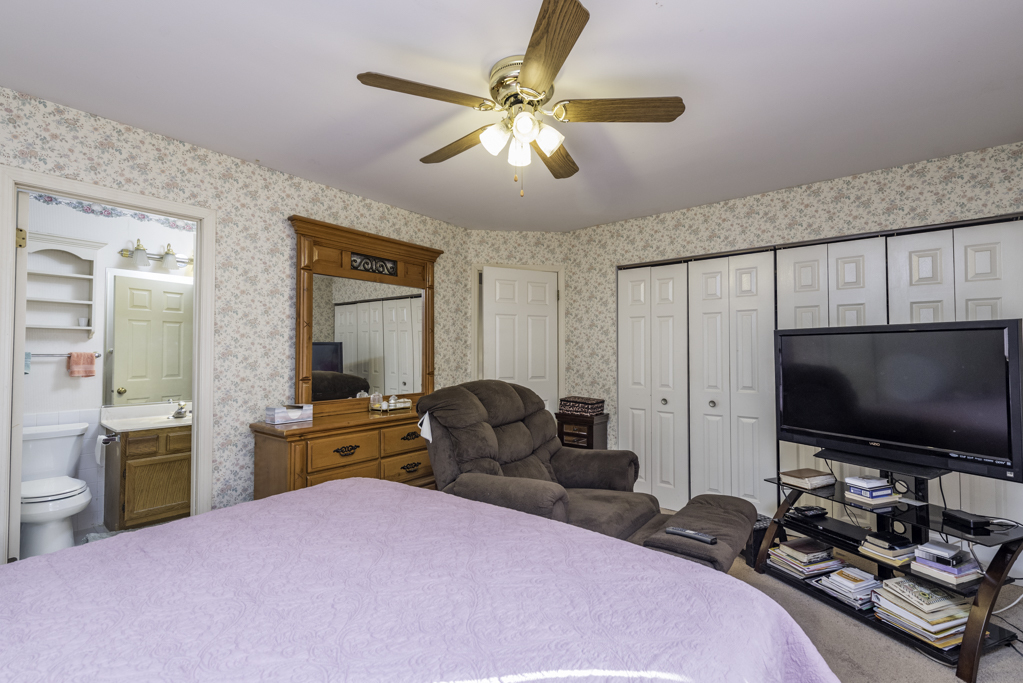 1834 Arbor Court Gurnee, IL 60031 - Photo 13 of 31 a bedroom with furniture and a flat screen tv
