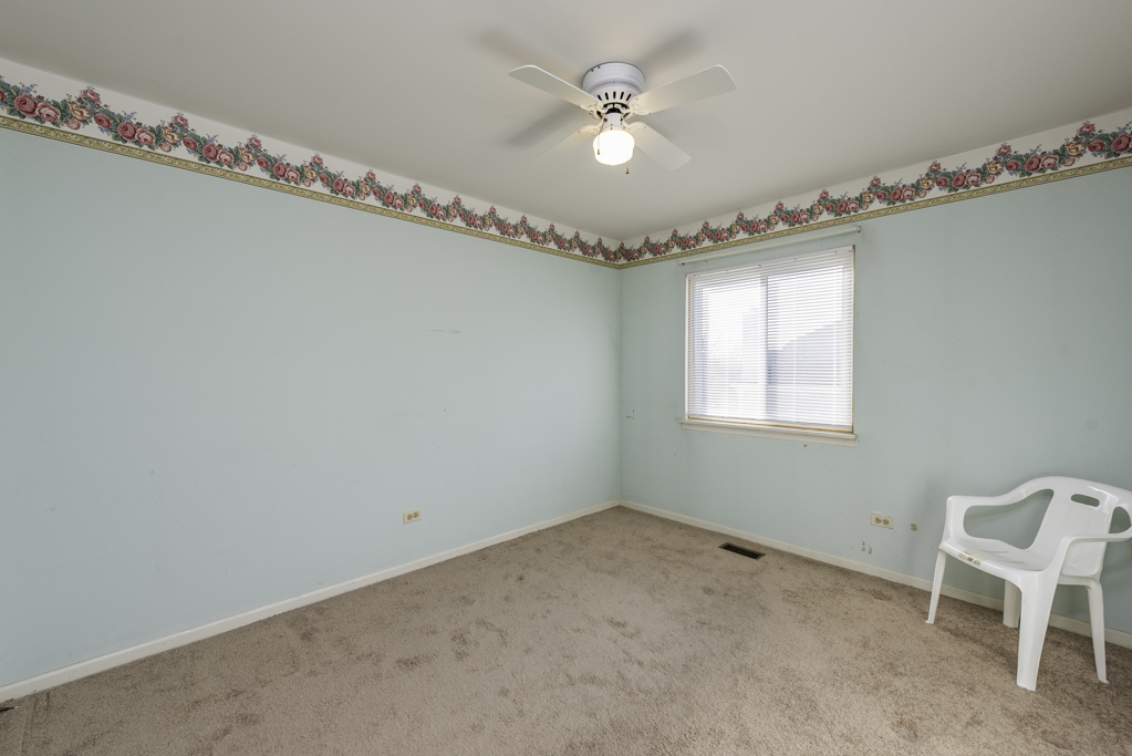 1834 Arbor Court Gurnee, IL 60031 - Photo 16 of 31 a view of a room with wooden floor and window