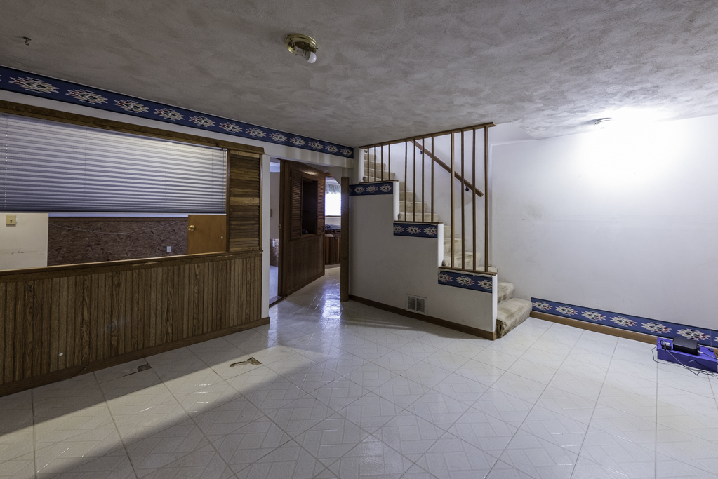 1834 Arbor Court Gurnee, IL 60031 - Photo 19 of 31 a view of an empty room with stairs