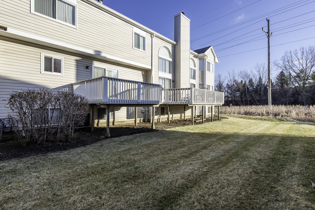 1834 Arbor Court Gurnee, IL 60031 - Photo 29 of 31 a view of a house with a yard and sitting area