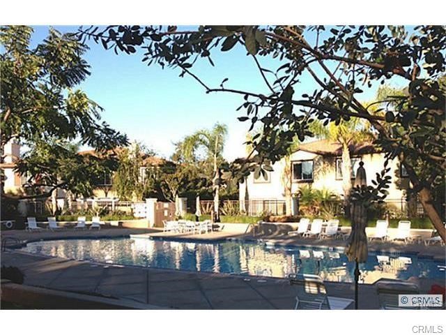 449 Ridgeway Irvine, CA 92620 - Photo 14 of 17 a view of a yard with a tree