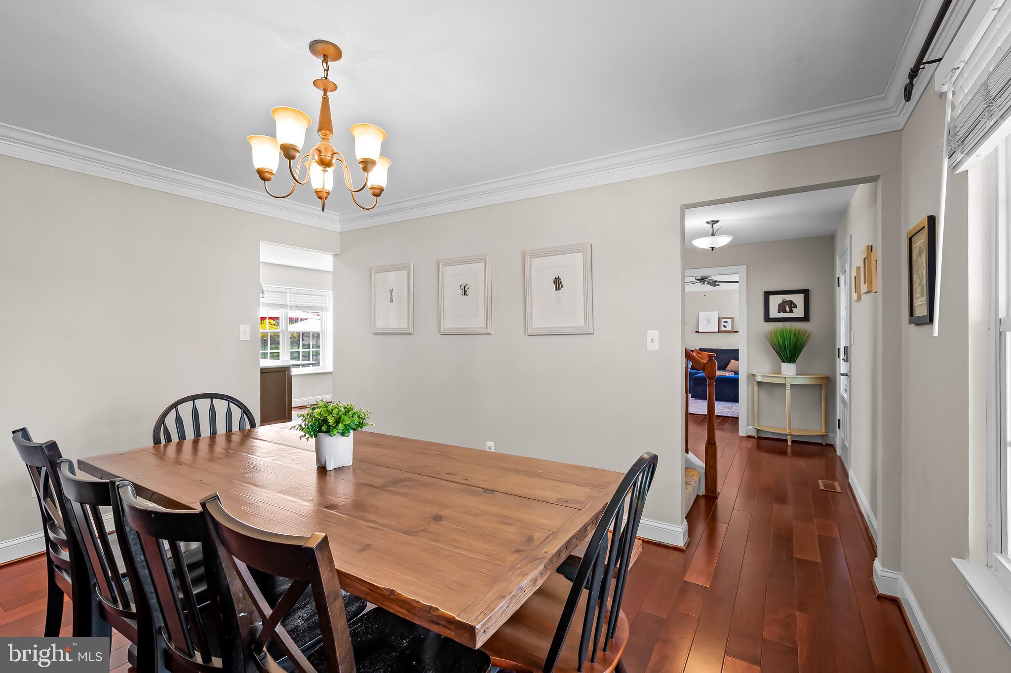 14305 Robcaste Road Phoenix, MD 21131 - Photo 20 of 53 a view of a dining room with furniture and wooden floor