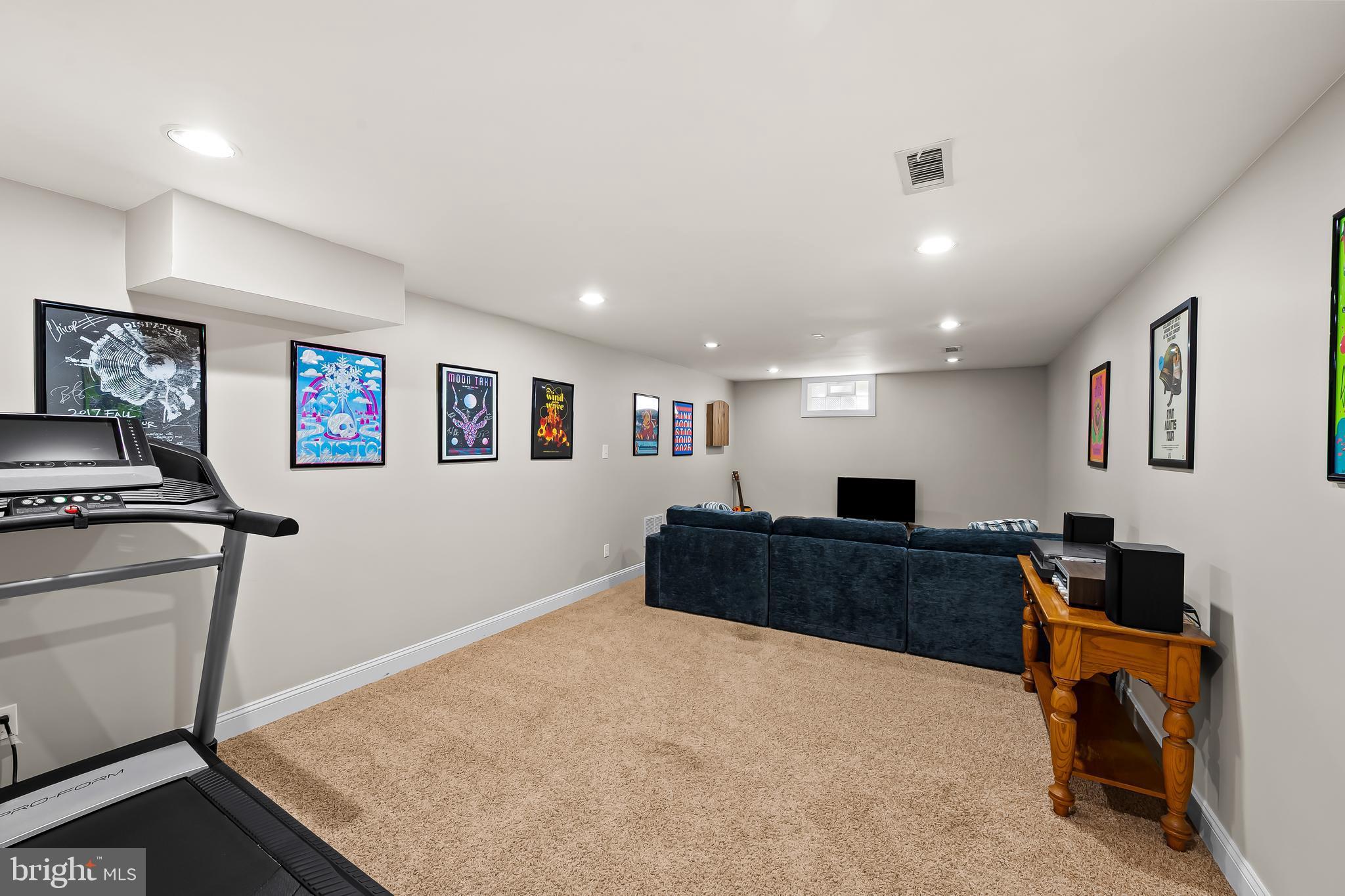 14305 Robcaste Road Phoenix, MD 21131 - Photo 23 of 53 a living room with furniture and a flat screen tv