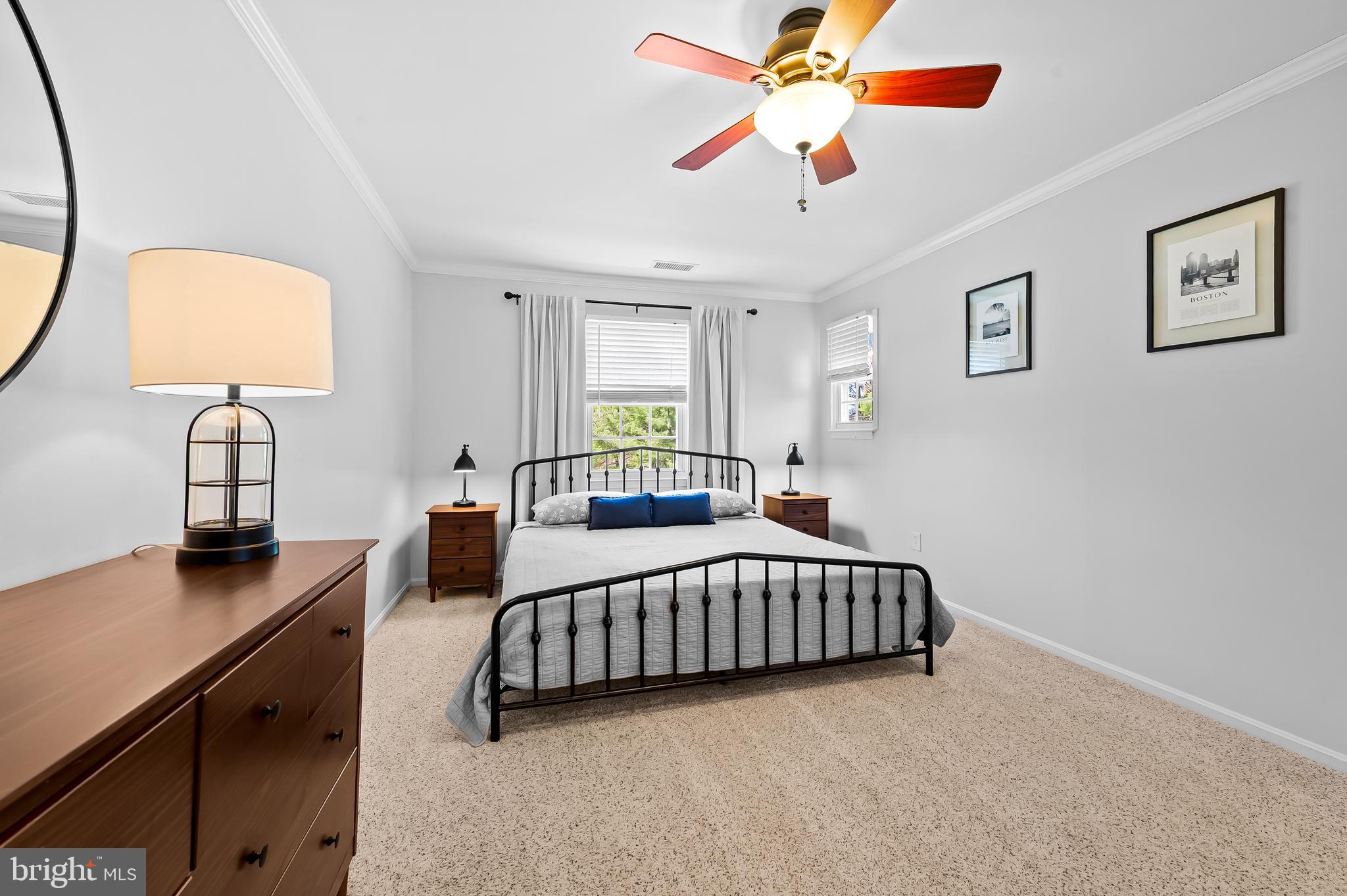 14305 Robcaste Road Phoenix, MD 21131 - Photo 28 of 53 a bedroom with furniture and a window