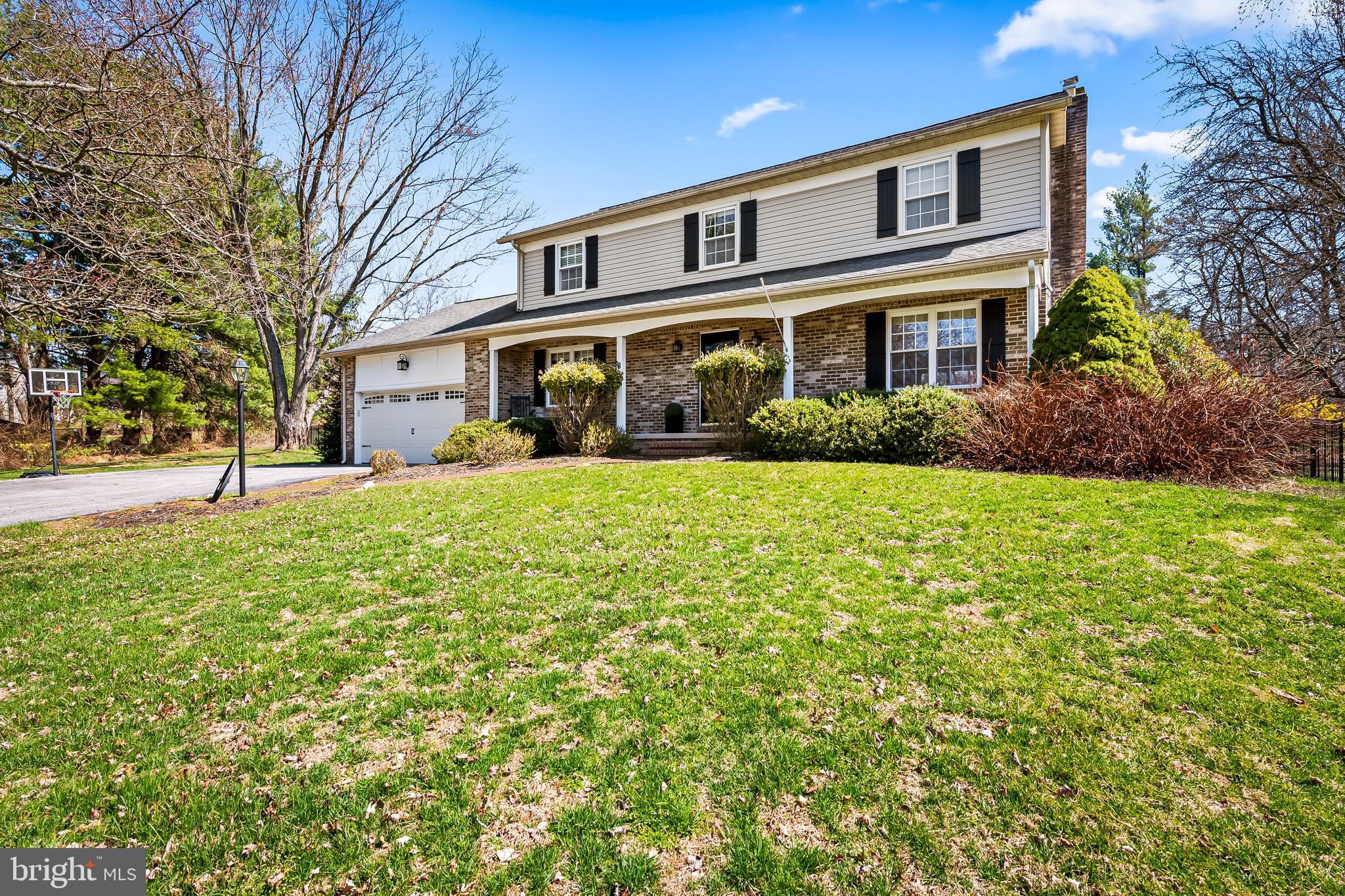 14305 Robcaste Road Phoenix, MD 21131 - Photo 3 of 53 a front view of a house with a yard