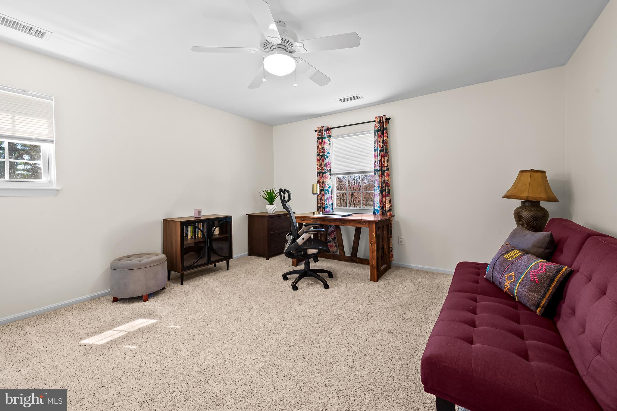 14305 Robcaste Road Phoenix, MD 21131 - Photo 34 of 53 a living room with furniture