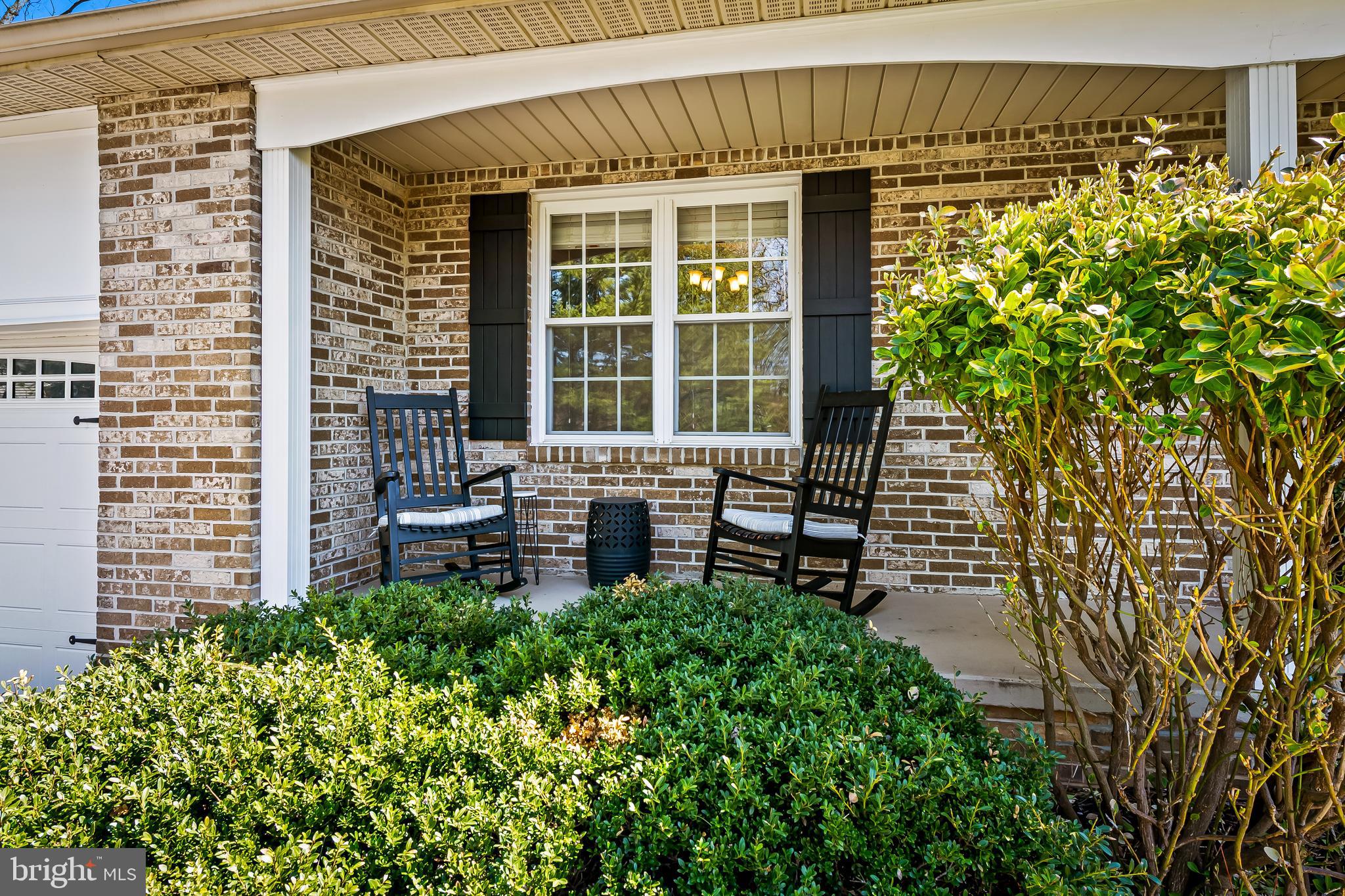 14305 Robcaste Road Phoenix, MD 21131 - Photo 4 of 53 front view of a house with a garden
