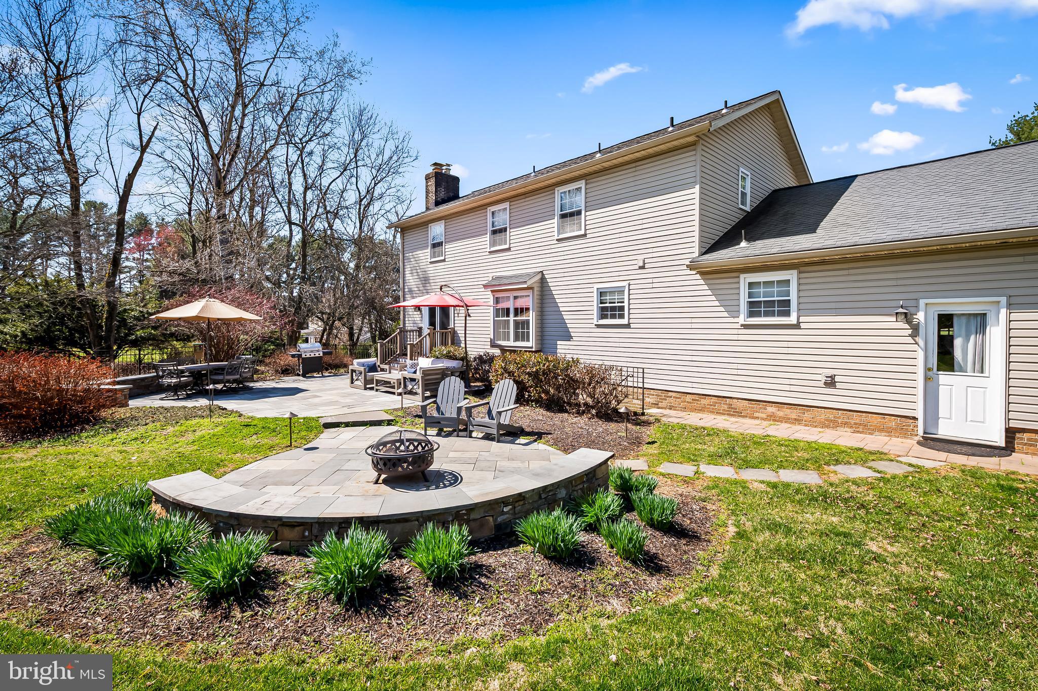 14305 Robcaste Road Phoenix, MD 21131 - Photo 42 of 53 a view of an house with backyard and sitting area