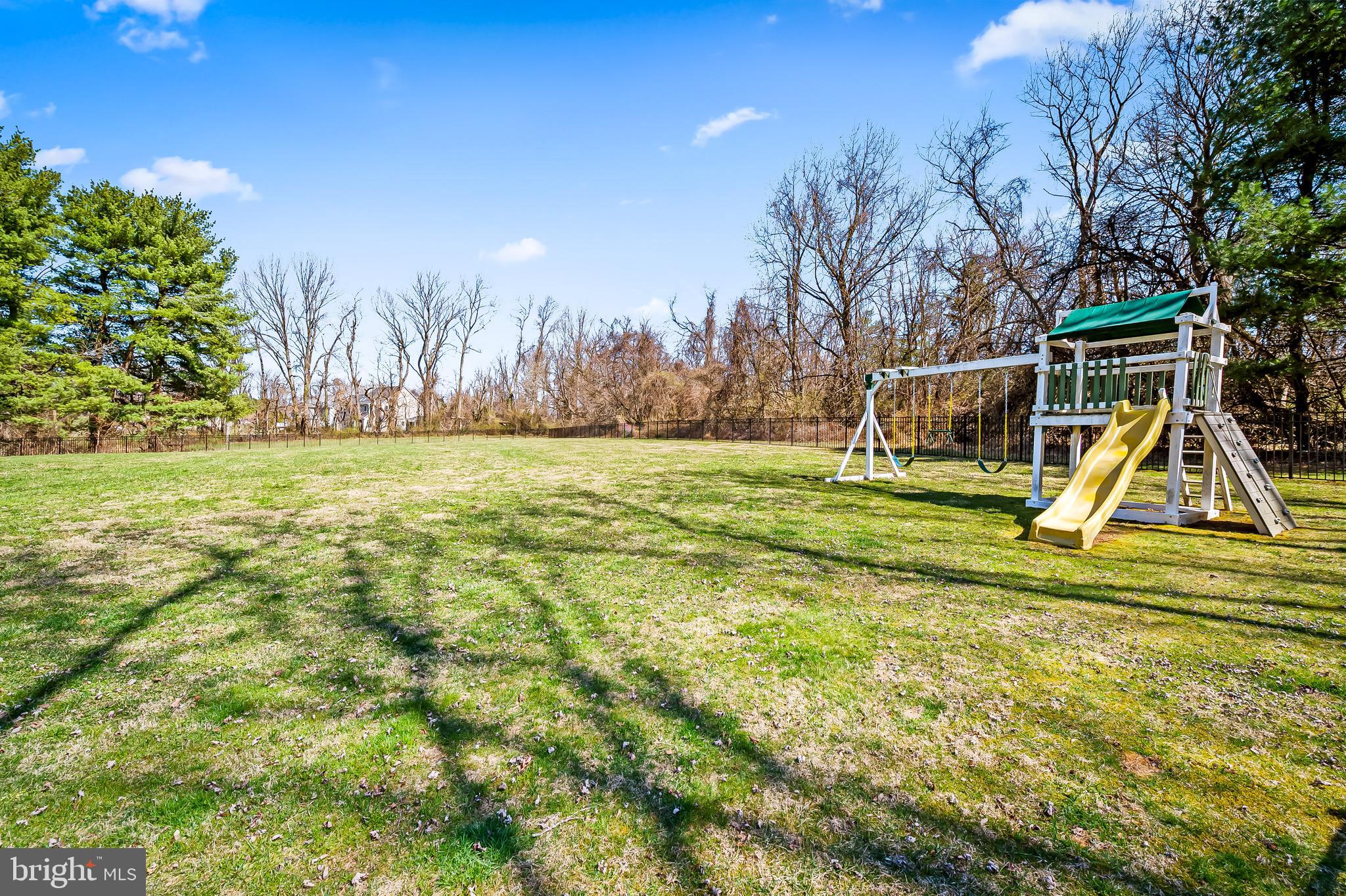 14305 Robcaste Road Phoenix, MD 21131 - Photo 45 of 53 a view of yard with swimming pool and trees