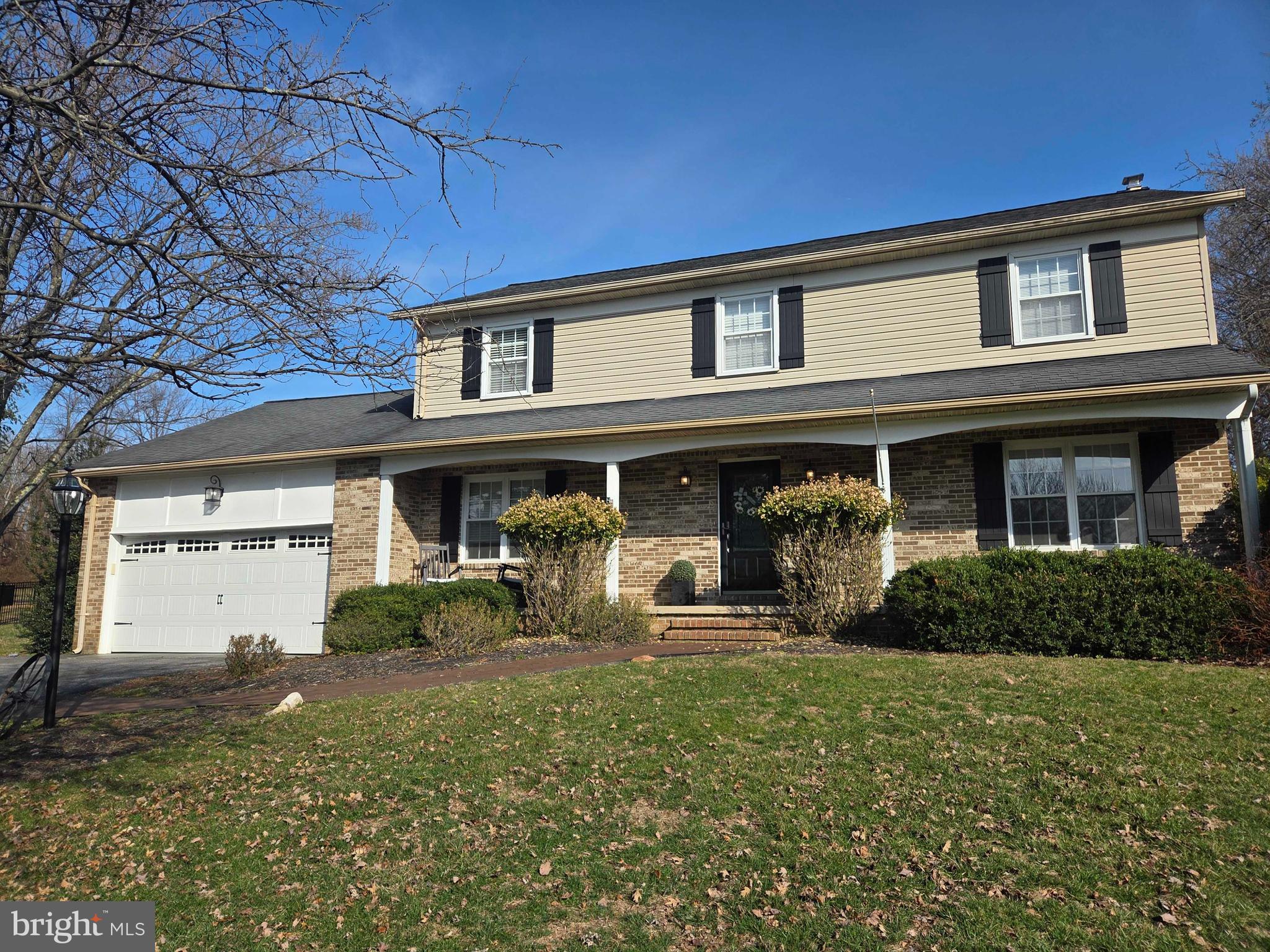 14305 Robcaste Road Phoenix, MD 21131 - Photo 49 of 53 a front view of a house with garden