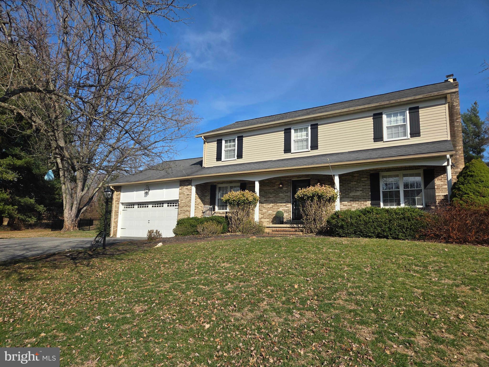 14305 Robcaste Road Phoenix, MD 21131 - Photo 50 of 53 a front view of a house with a yard