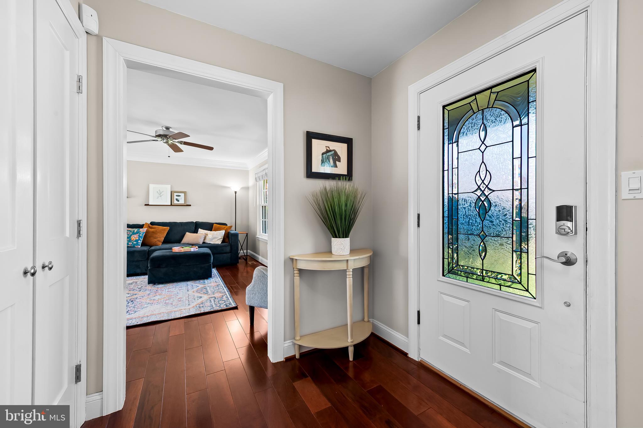 14305 Robcaste Road Phoenix, MD 21131 - Photo 5 of 53 a view of a livingroom with a window and wooden floor