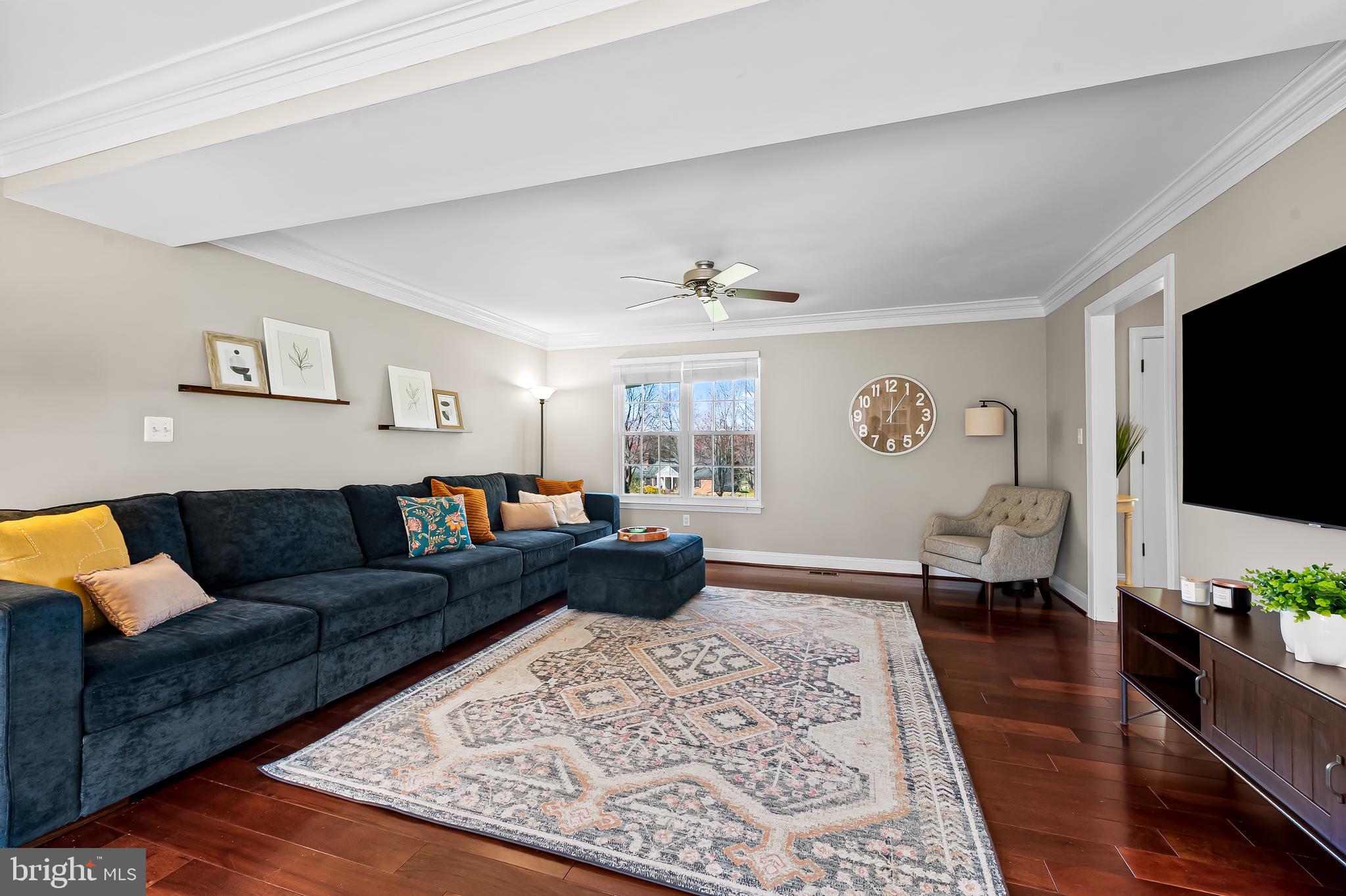 14305 Robcaste Road Phoenix, MD 21131 - Photo 6 of 53 a living room with furniture and a flat screen tv