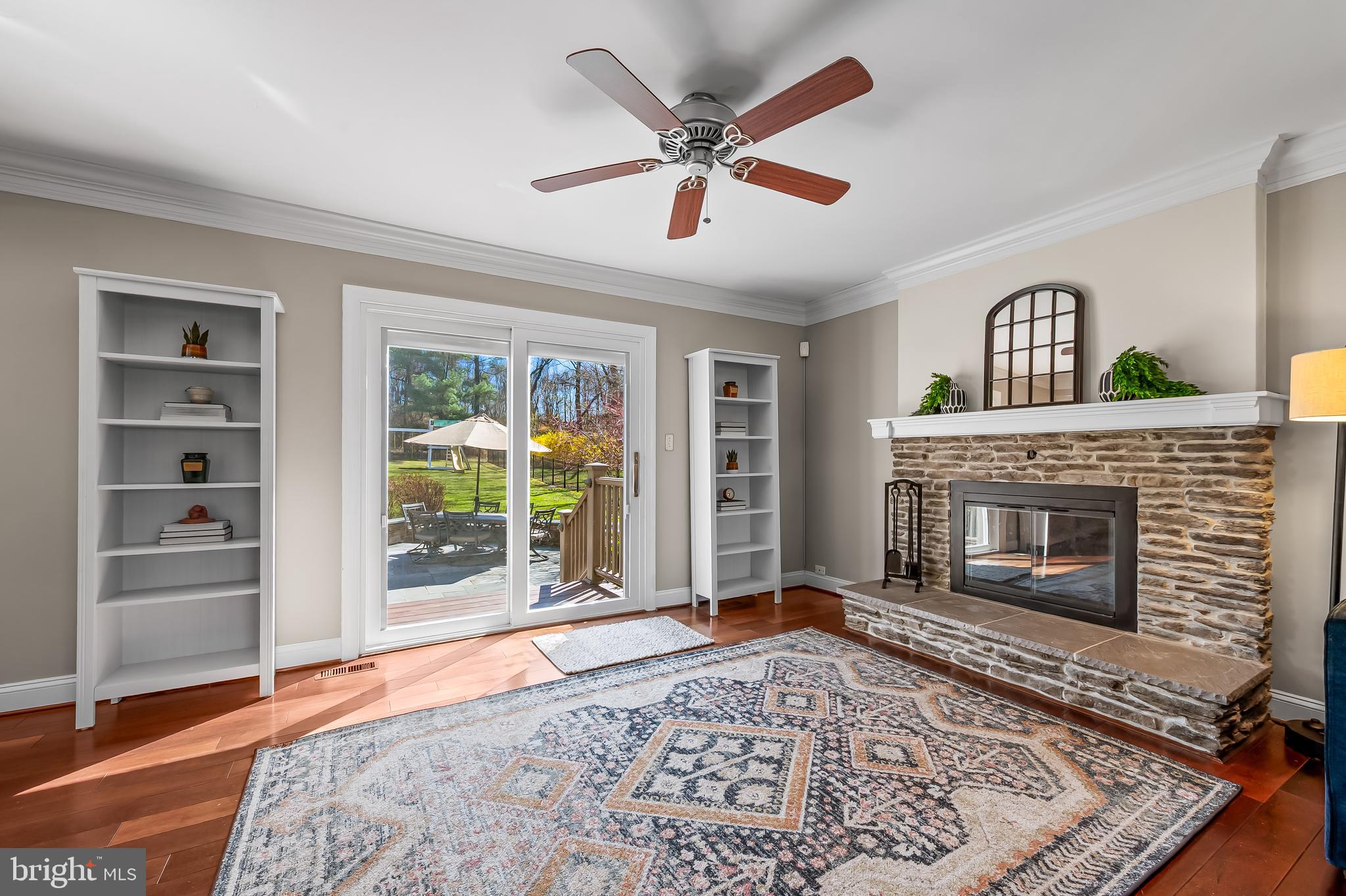 14305 Robcaste Road Phoenix, MD 21131 - Photo 9 of 53 a living room with furniture and a fireplace