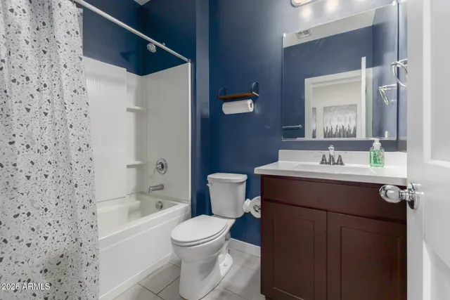 a living room with furniture and a couch