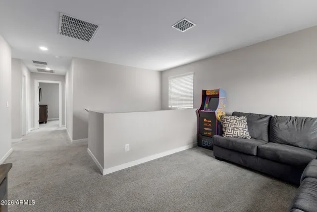 a bathroom with a double vanity sink a mirror and a shower