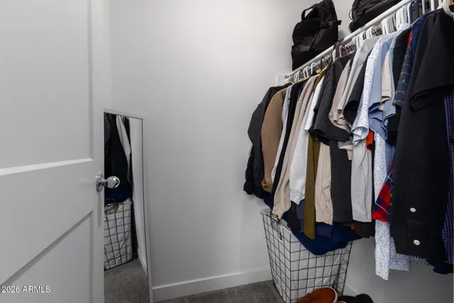 a view of a swimming pool with a lounge chairs