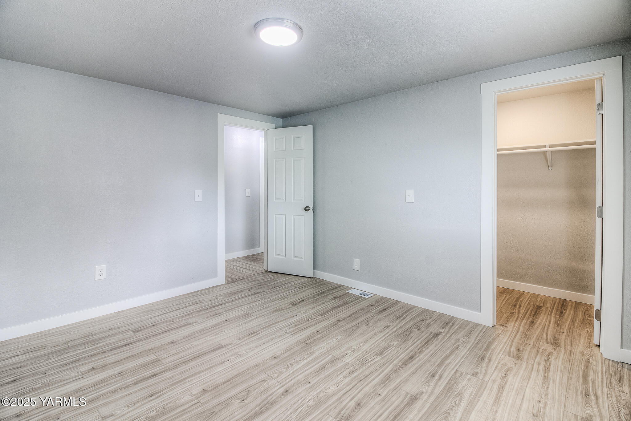 10420 Ahtanum Road Yakima, WA 98903 - Photo 14 of 24 a view of an empty room with wooden floor