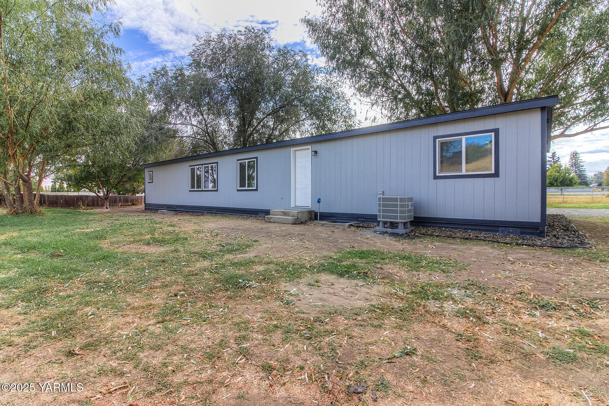 10420 Ahtanum Road Yakima, WA 98903 - Photo 20 of 24 a view of a house with yard and trees