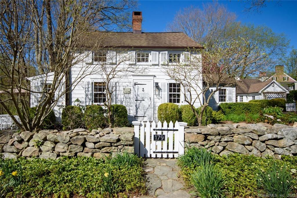 179 Silver Spring Road Wilton, CT 06897 - Photo 1 of 1 a front view of a house with a yard