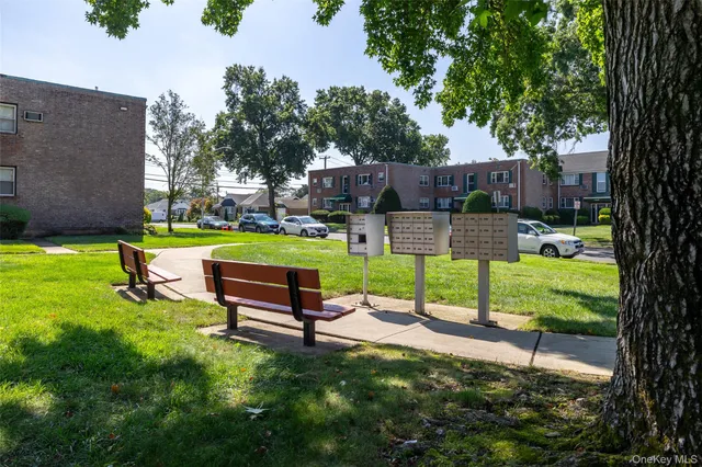 a park bench sitting in the middle of a park