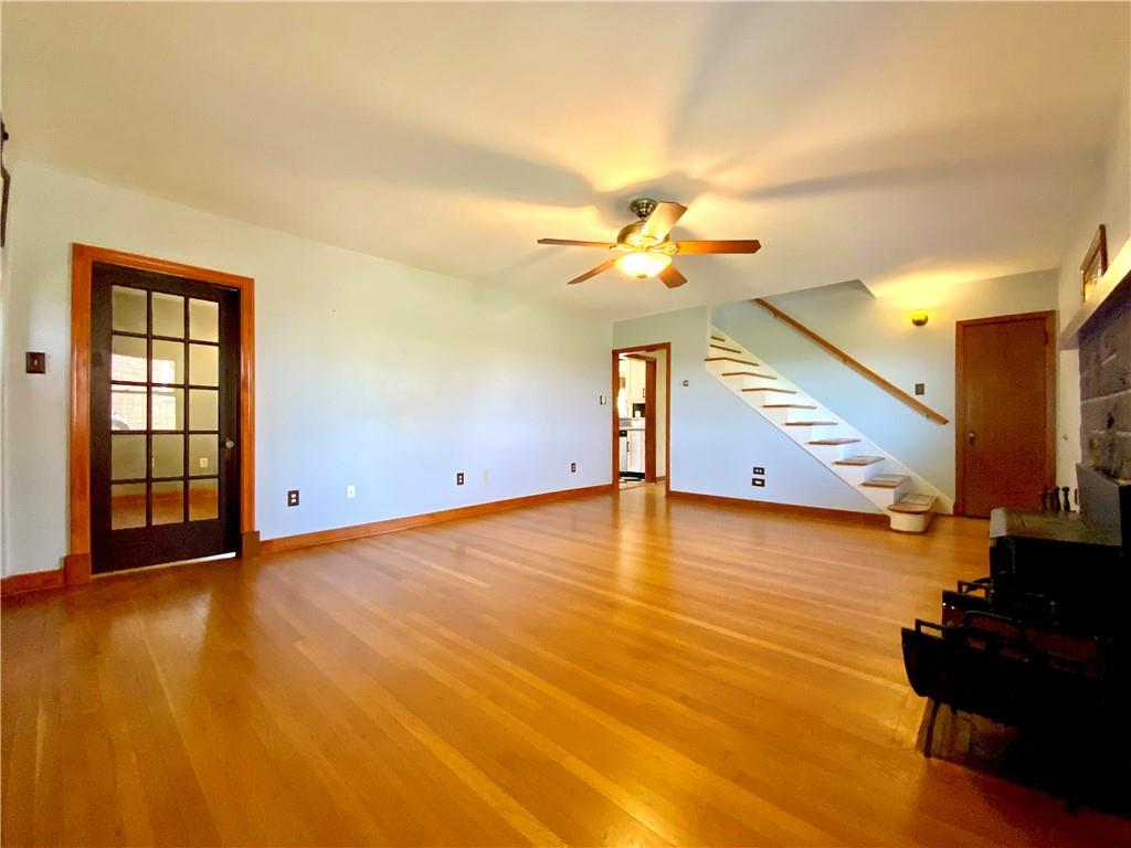 629 Ridge Road Ambridge, PA 15003 - Photo 6 of 38 Another view of the living room looking towards the kitchen and den