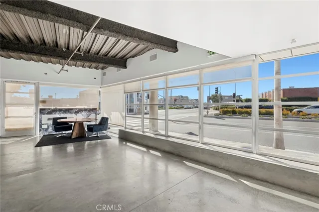 a view of kitchen with furniture and fireplace