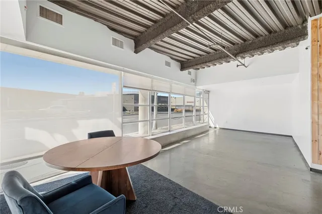 a view of a room with furniture