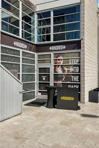 a view of a building with the entryway of a building