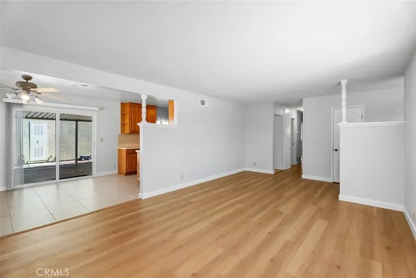 a kitchen with a stove a sink and a refrigerator