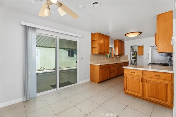 a kitchen with stainless steel appliances granite countertop a stove and a sink