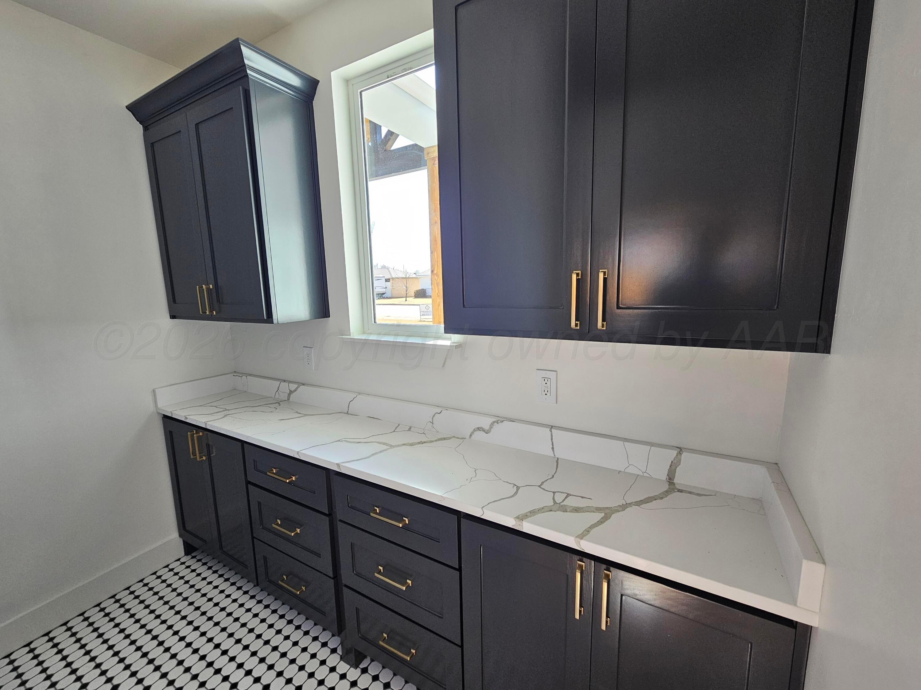 1010 Oak Avenue Panhandle, TX 79068 - Photo 19 of 44 a bathroom with a sink a vanity and a mirror