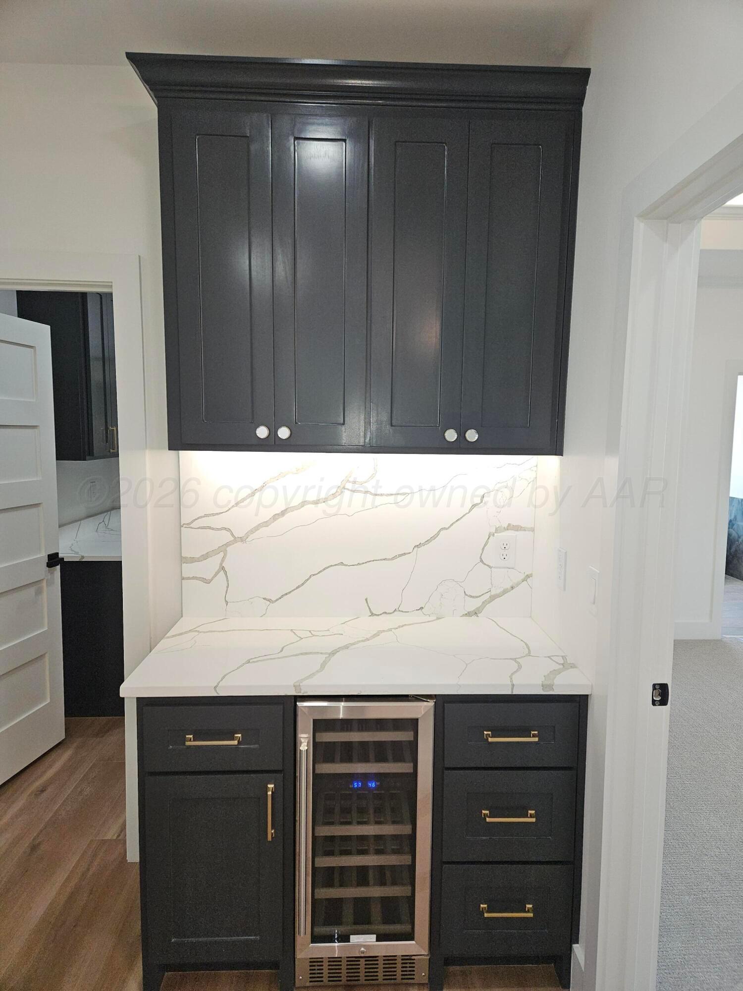 1010 Oak Avenue Panhandle, TX 79068 - Photo 20 of 44 a view of kitchen with granite countertop cabinets and black appliances