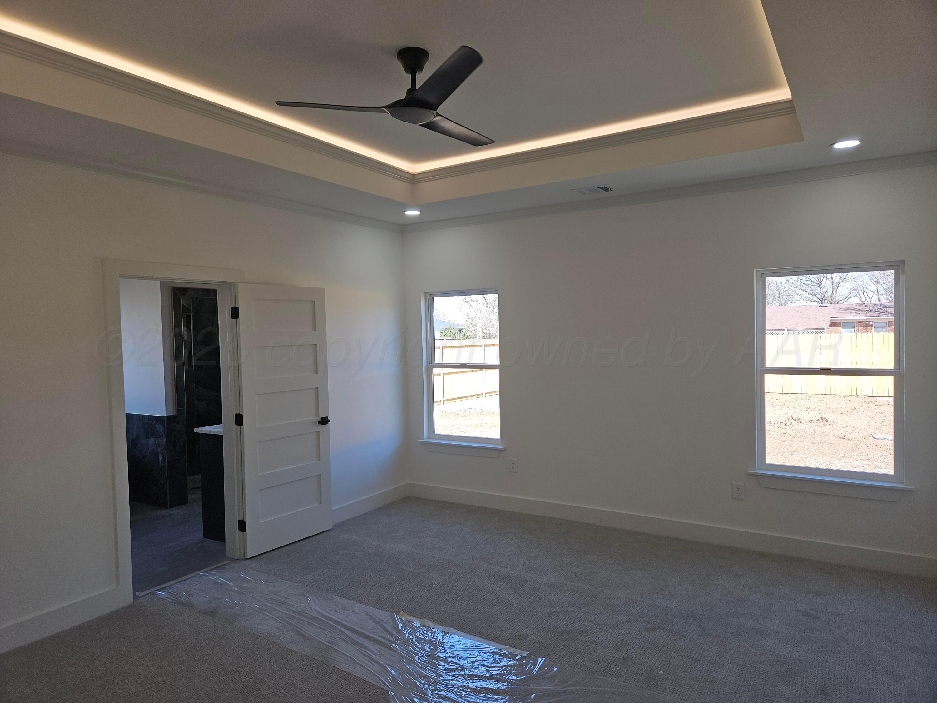 1010 Oak Avenue Panhandle, TX 79068 - Photo 21 of 44 a view of empty room with windows