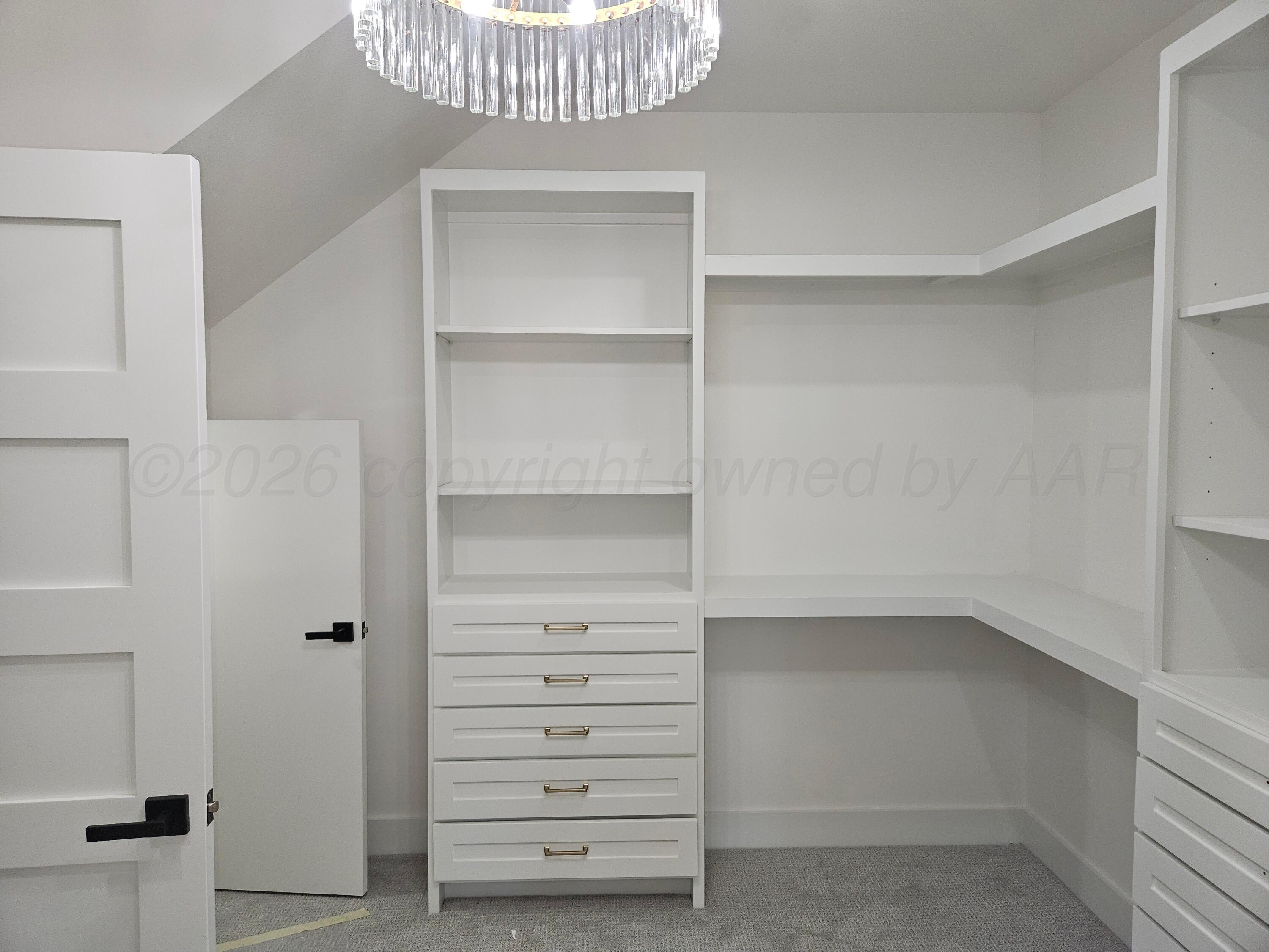 1010 Oak Avenue Panhandle, TX 79068 - Photo 22 of 44 a view of walk in closet with empty racks