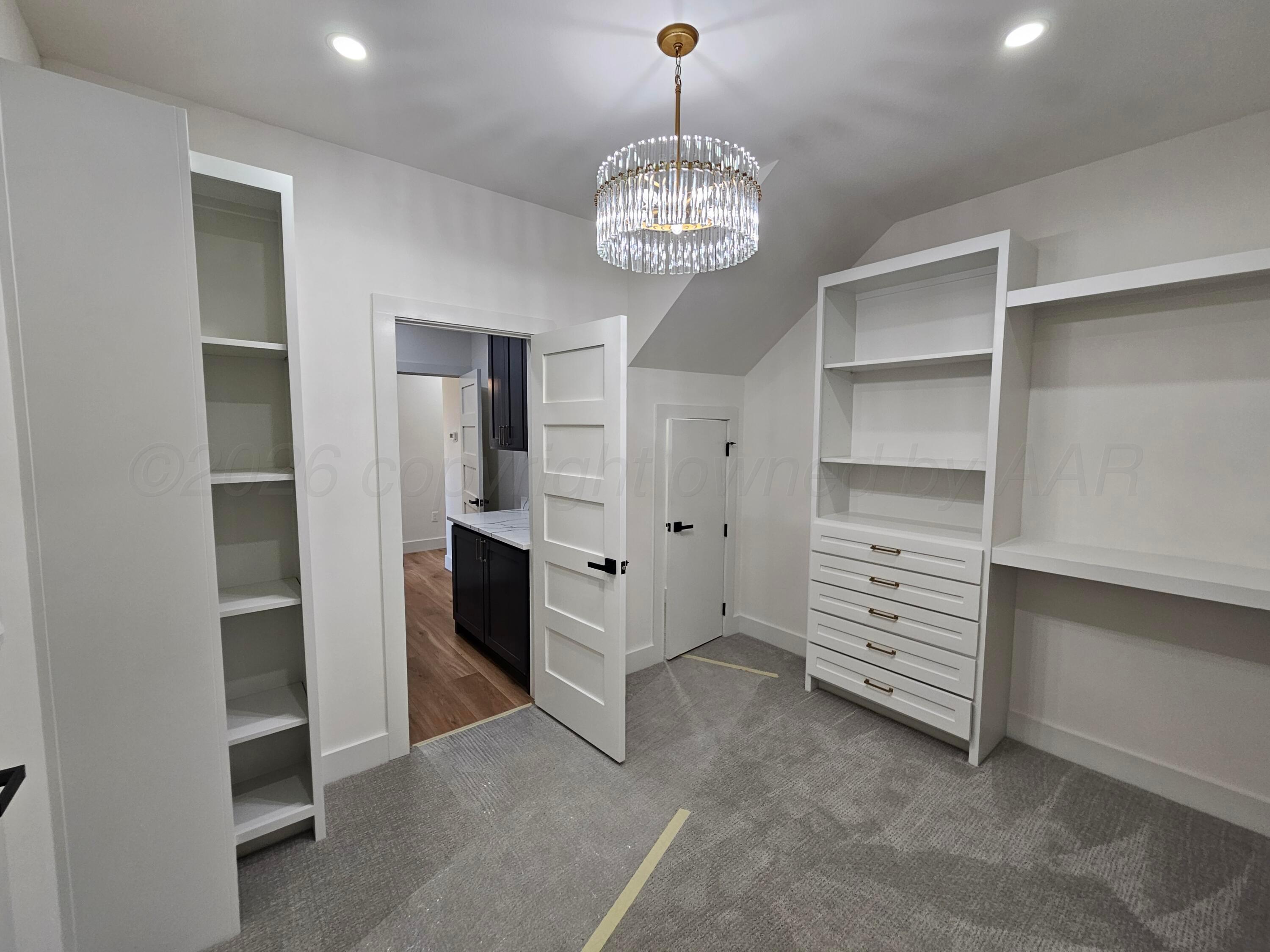1010 Oak Avenue Panhandle, TX 79068 - Photo 24 of 44 an empty room with closet and windows