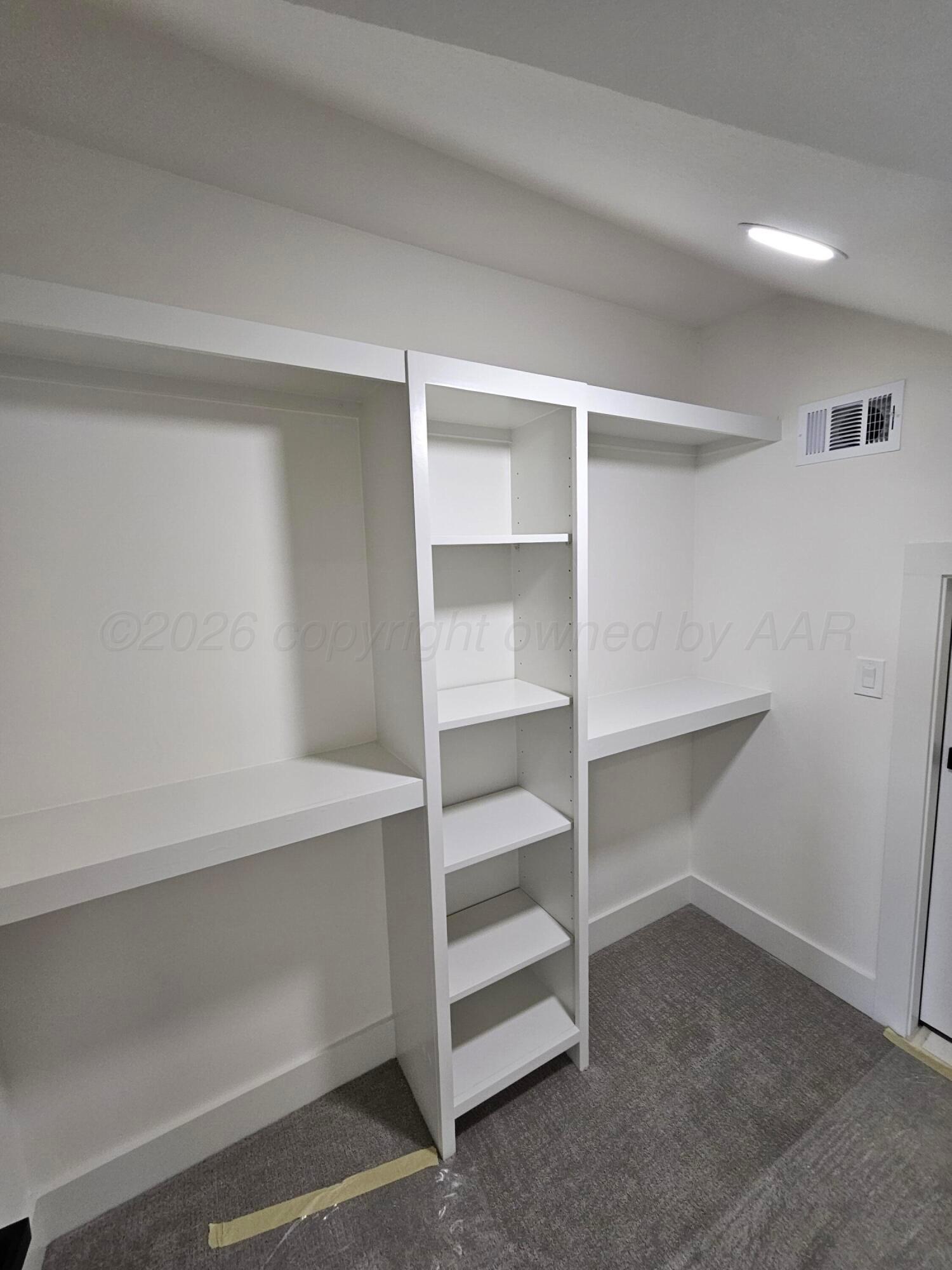 1010 Oak Avenue Panhandle, TX 79068 - Photo 34 of 44 a view of an empty walk in closet