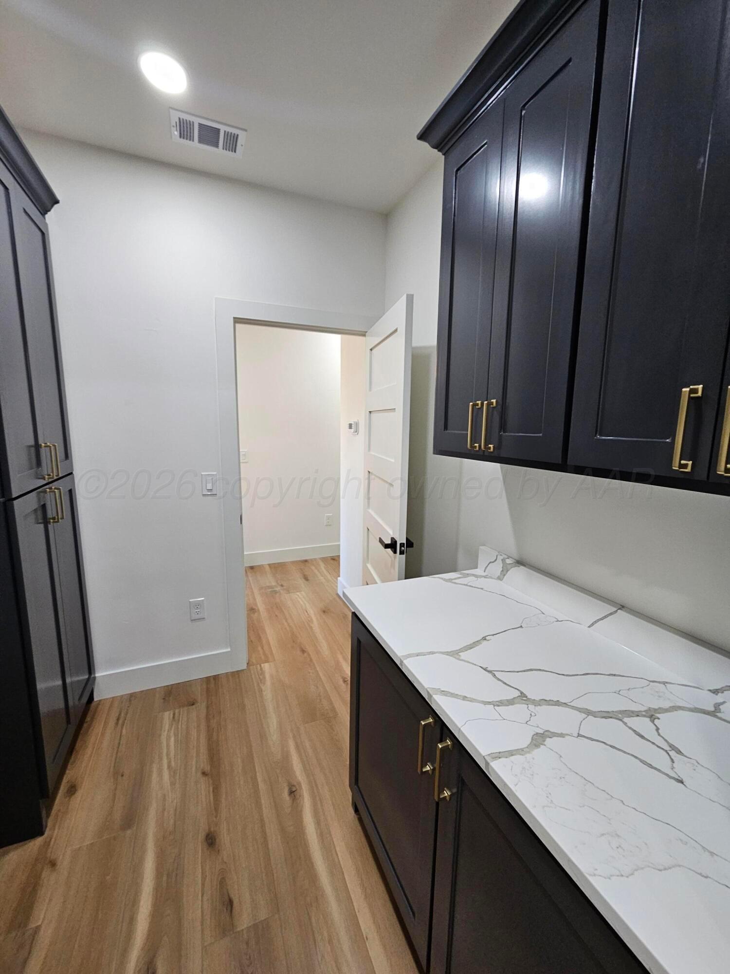 1010 Oak Avenue Panhandle, TX 79068 - Photo 41 of 44 a bathroom with a sink and a mirror