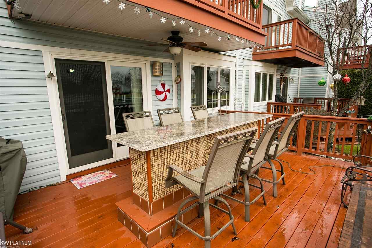 655 Pte Tremble Algonac, MI 48001 - Photo 28 of 39 Large Deck/Bar