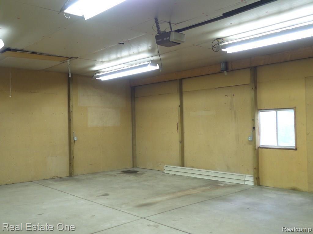 3894 Lippincott Road Lapeer, MI 48446 - Photo 28 of 34 Large and well lit 2nd garage