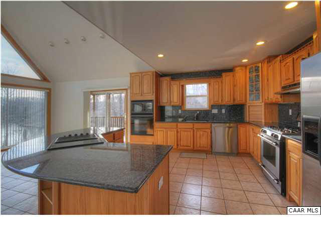 27 Tanglewood Road Palmyra, VA 22963 - Photo 5 of 23 Great Kitchen - Granite Countertops and Backsplash, 2-cooktops, 2-ovens, Jenn-Air surface grill, Stainless