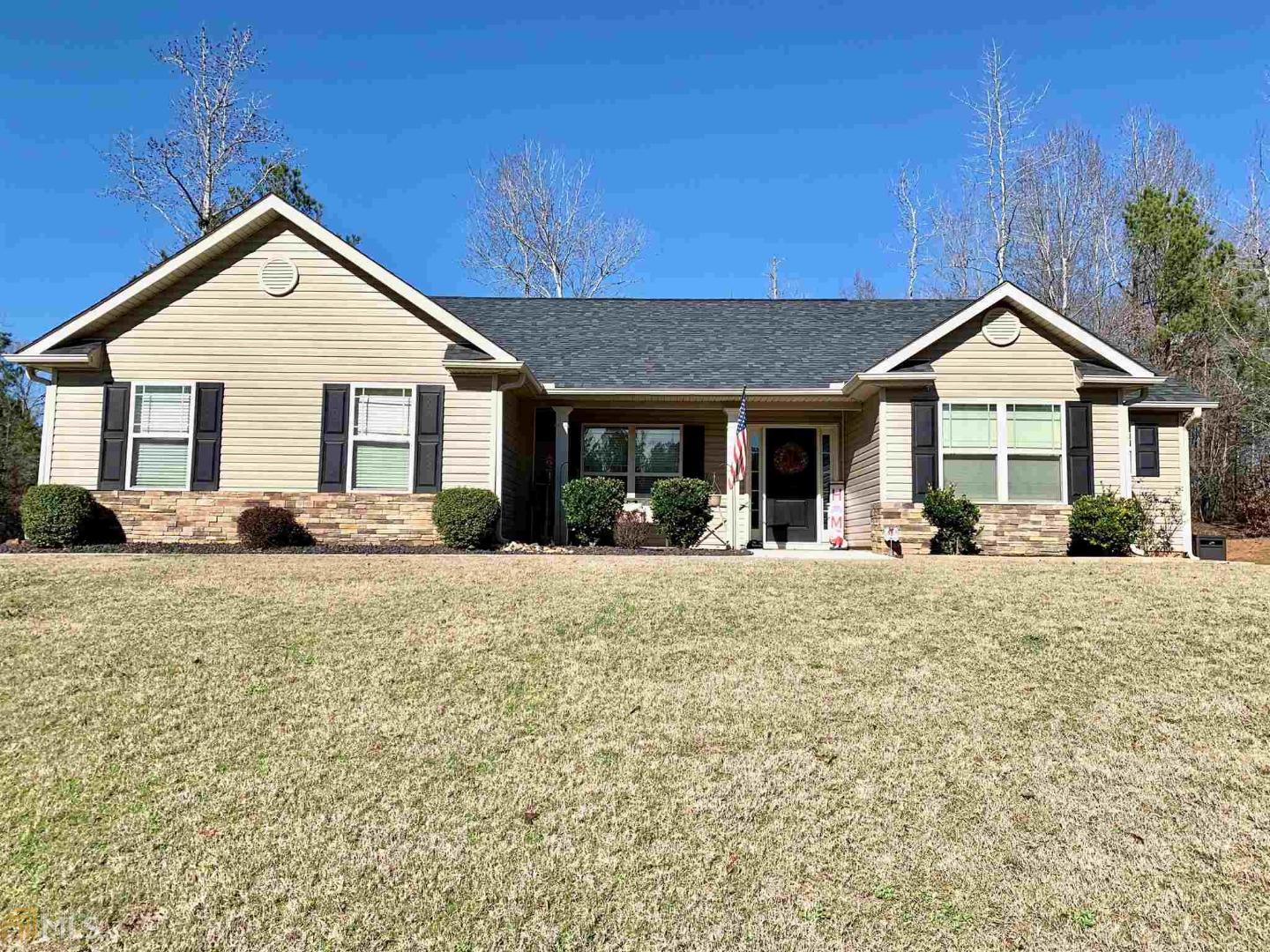 57 Coggins Road Newnan, GA 30263 - Photo 1 of 1 a front view of a house with a yard