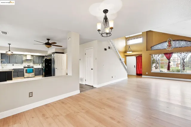 a view of a kitchen with furniture and window