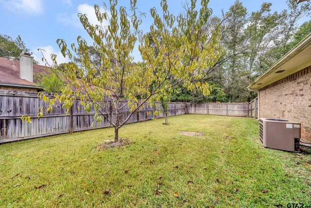 a swimming pool with wooden fence