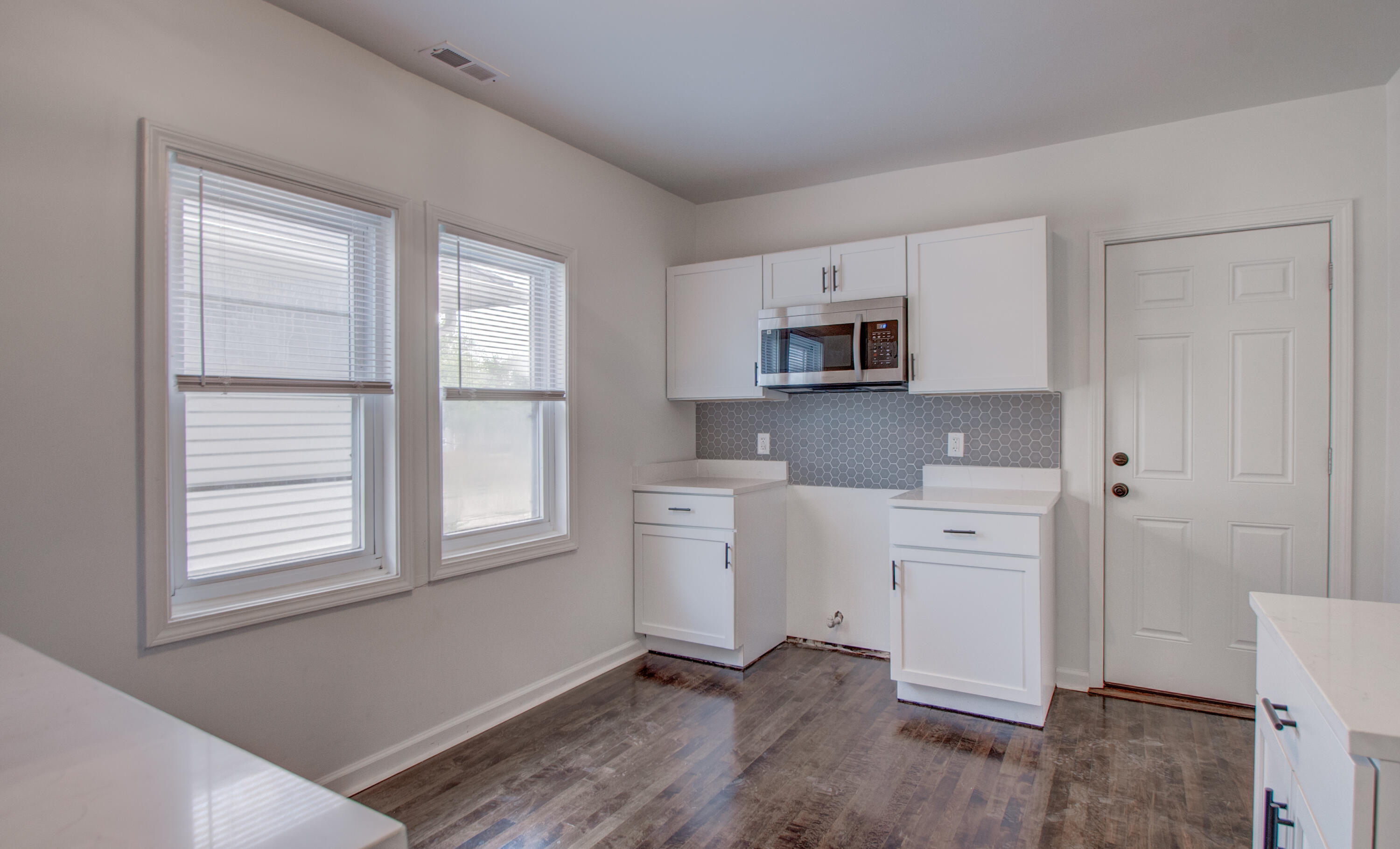 613 Tennessee Street Gary, IN 46402 - Photo 15 of 39 a room with a window and a dresser