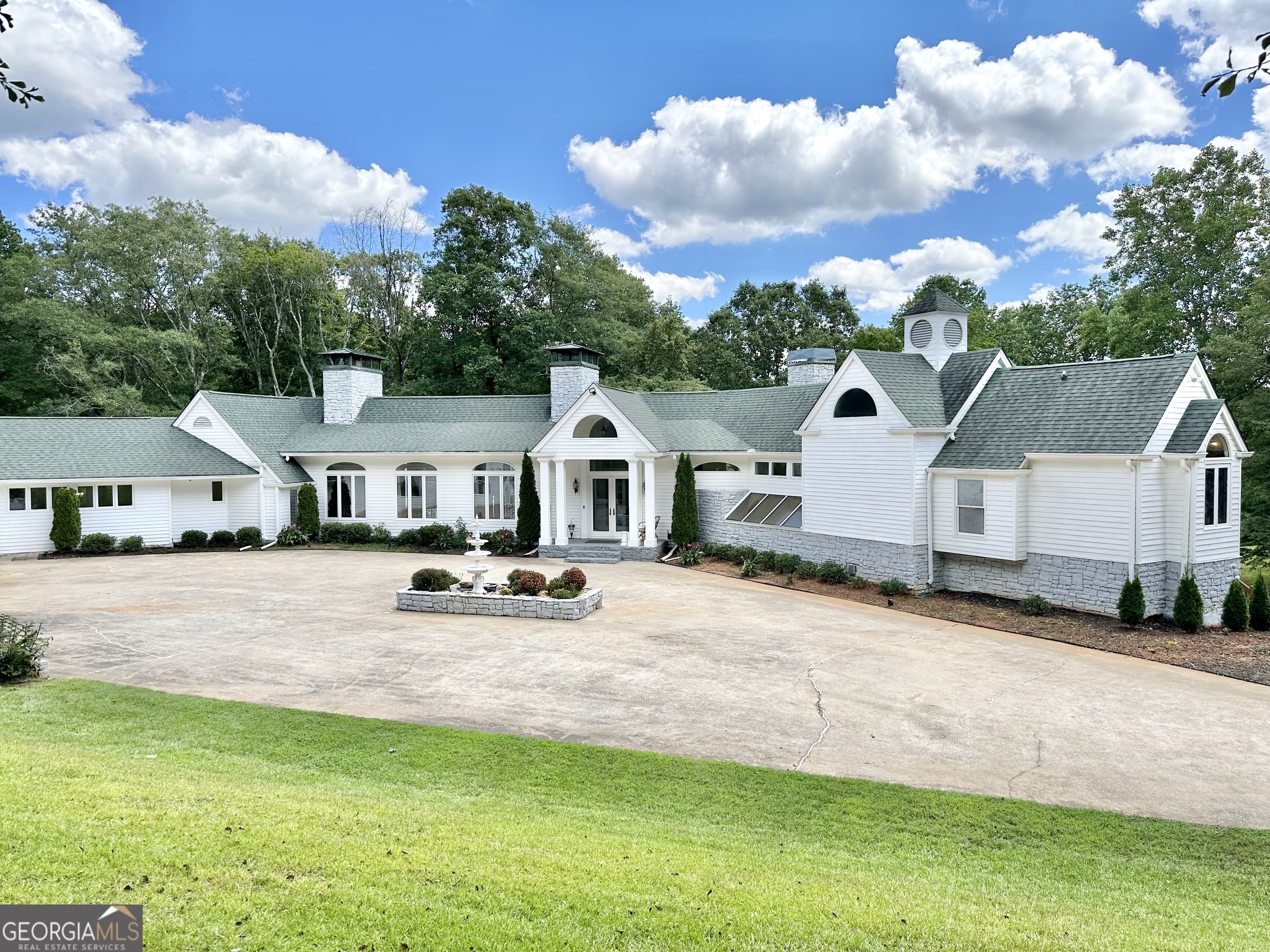 5045 Pool Mill Road Winston, GA 30187 - Photo 1 of 1 a front view of a house with yard and green space