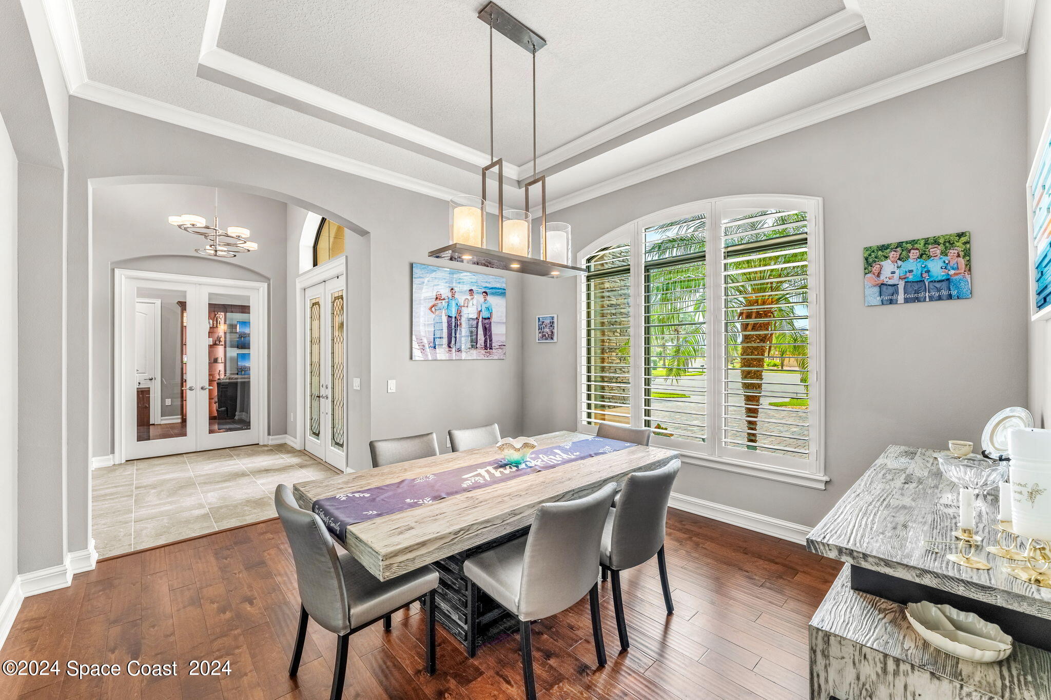 213 Loggerhead Drive Melbourne Beach, FL 32951 - Photo 22 of 58 a dining room with furniture and window